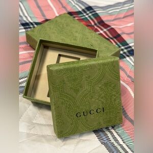 3 Gucci boxes:  key ring box, purse box, and business card holder box.